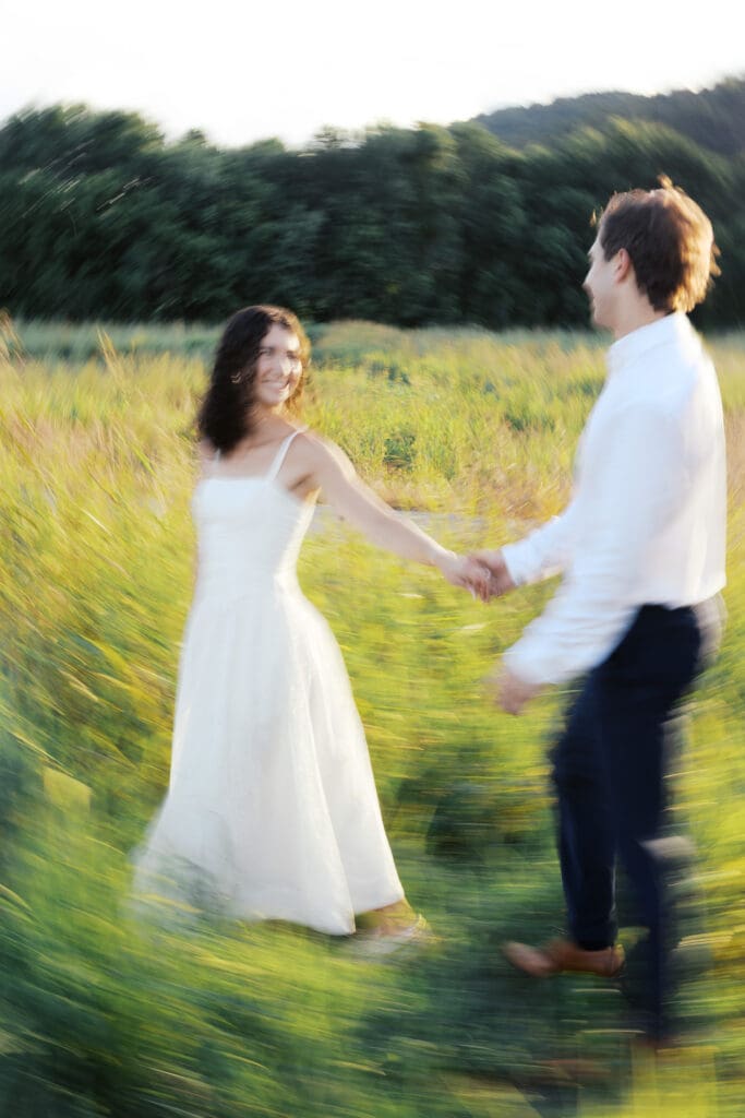 flowing dress movement during engagement session in natural light