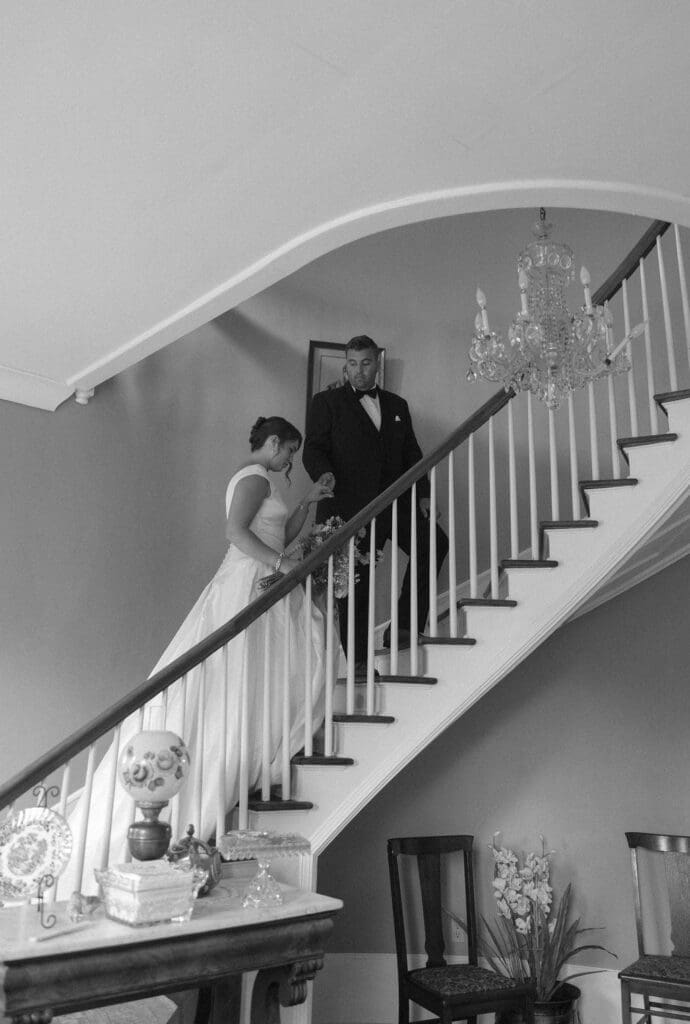 bride and groom walking hand in hand  during a wedding in East Tennessee