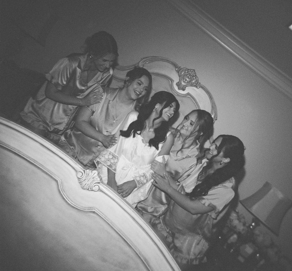 candid moment with bride and bridesmaids during wedding morning